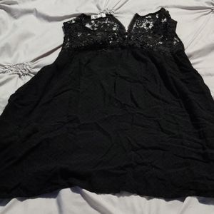 Maurice's sexy no sleeve shirt.